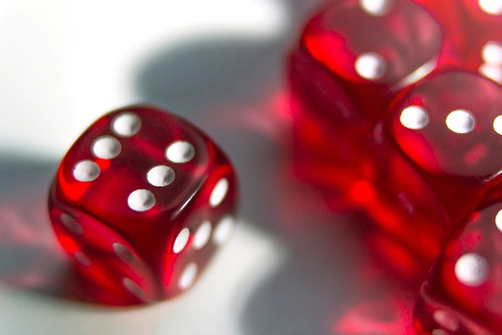 Gaming chips and cards on the table felt